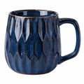 Tazza in ceramica blu 450 ml con manico e rilievo decorativo